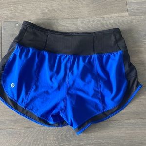 Speed up shorts blue black with mesh detail low rise Lululemon shorts 4 like new